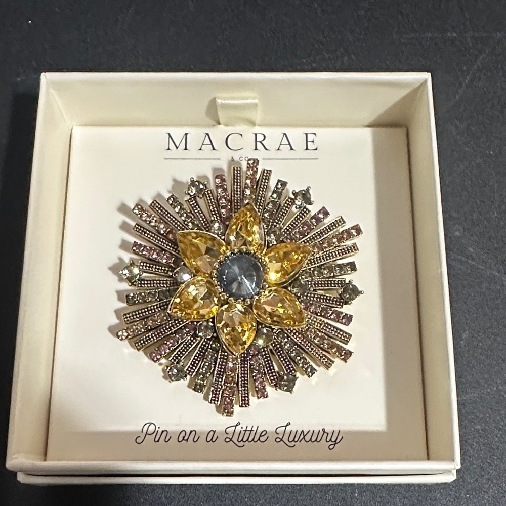 Macrae gold flower brooches